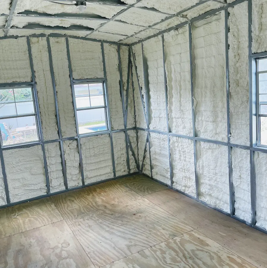 Closed-cell spray foam insulation applied to wall cavities in a residential project in Rosemont